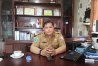 Plt Kepala Dinas Perkebunan Fakfak Widhi Asmoro Jati, ST. MT saat di temui wartawan papuabarat.tagarutama.com di ruang kerjanya (Dok. papuabarat.tagarutama.com)